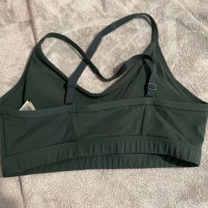 Dark green gym shark sports bra. Size medium. No padding